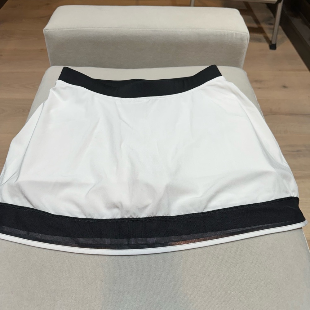 Lululemon tennis / running skirt / skort white with black detailing, size 6